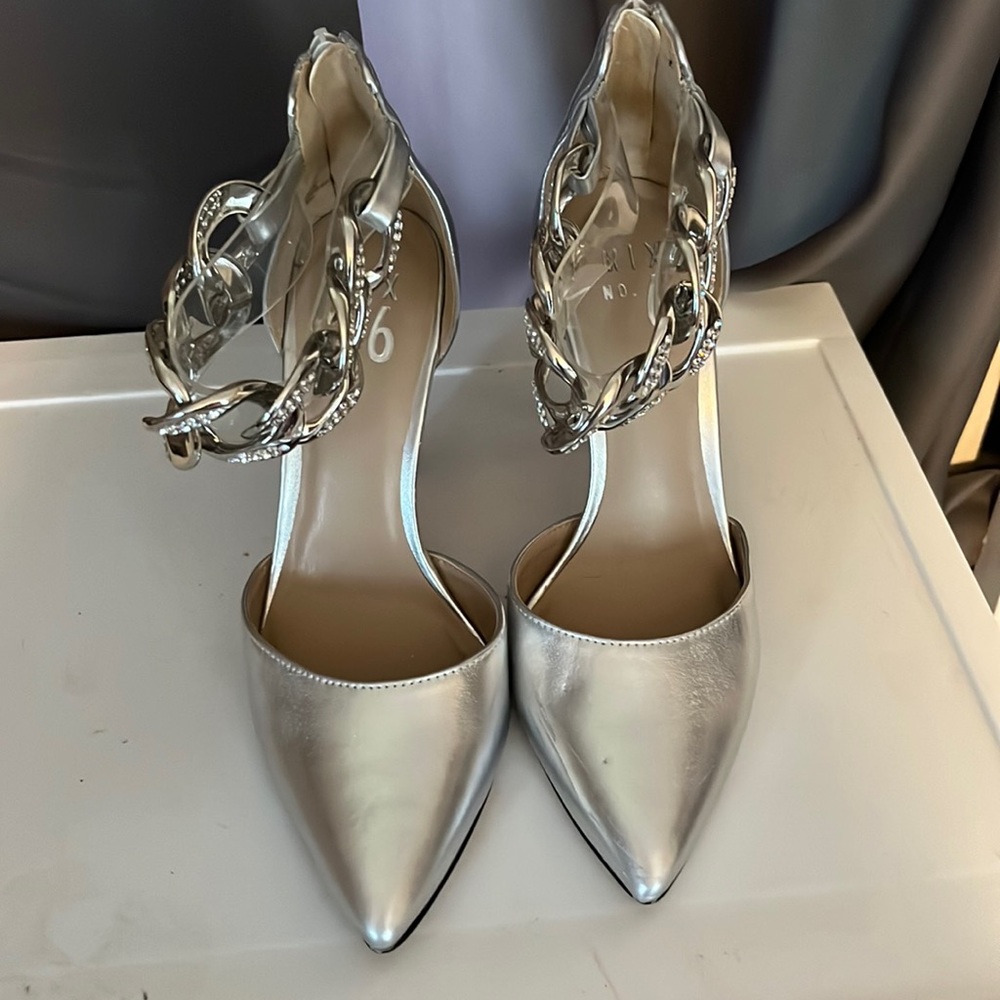 silver pointed toe high heeled shoes